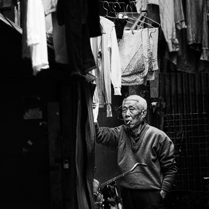 smoker in the alley-Shanghai- photo by mimo